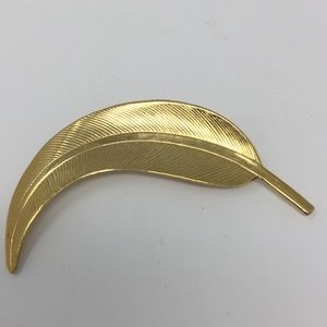 Vintage gold leaf pin.